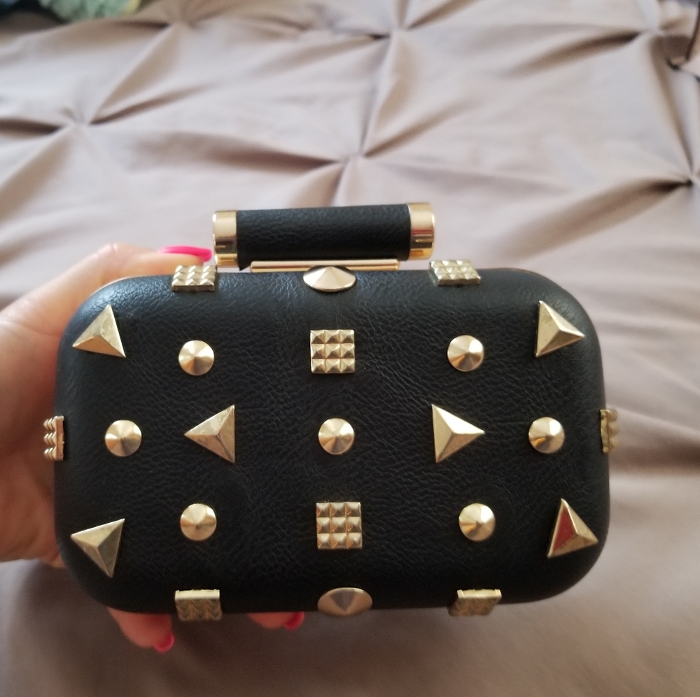 Small Black Clutch with gold color decoration